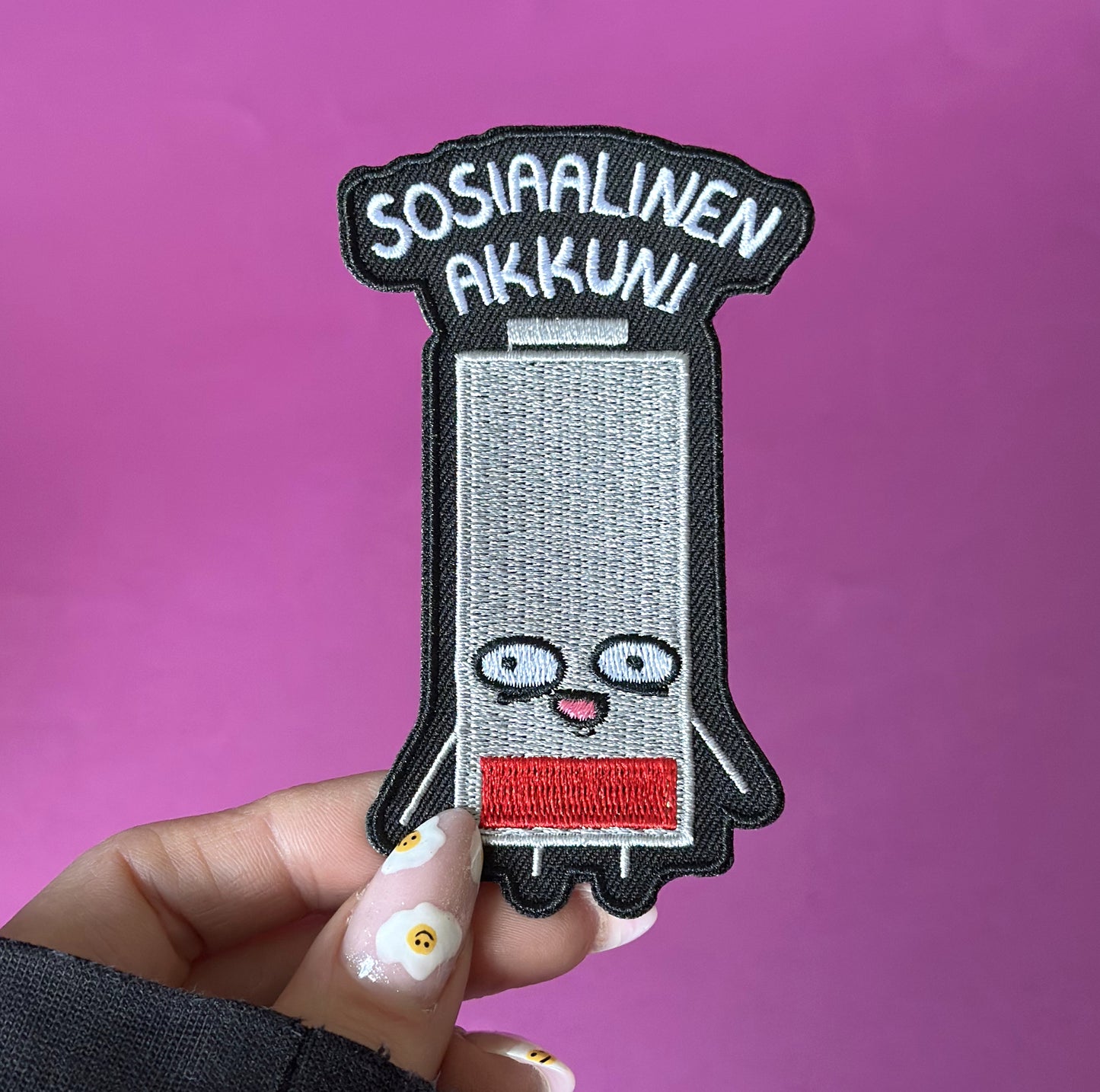 Sosiaalinen akkuni - Kangasmerkki