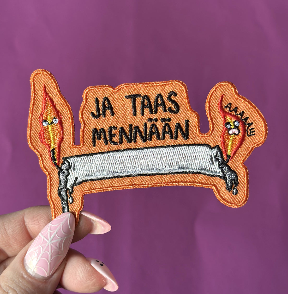Ja taas mennään - Kangasmerkki